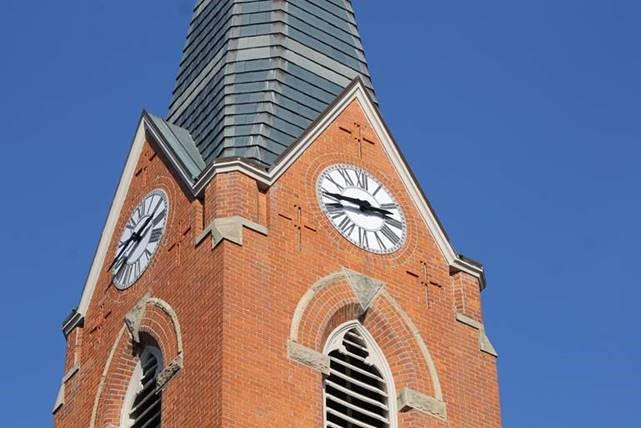 St. Anthony refurbishedtower clock by day